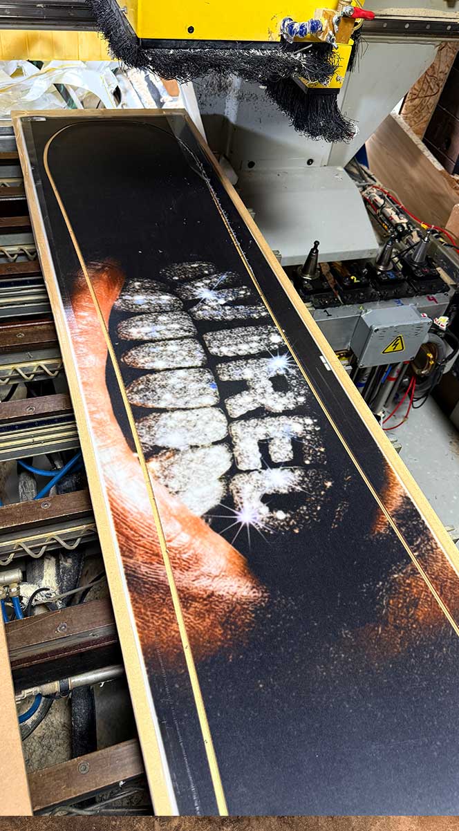 Custom snowboard being built at the Wired factory in Vancouver, Canada