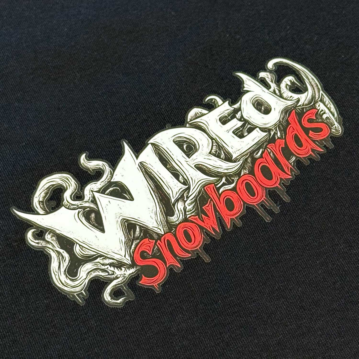 Wired &#39;DOODLE&#39; T-Shirt showcasing hand-drawn logo design on black cotton fabric.